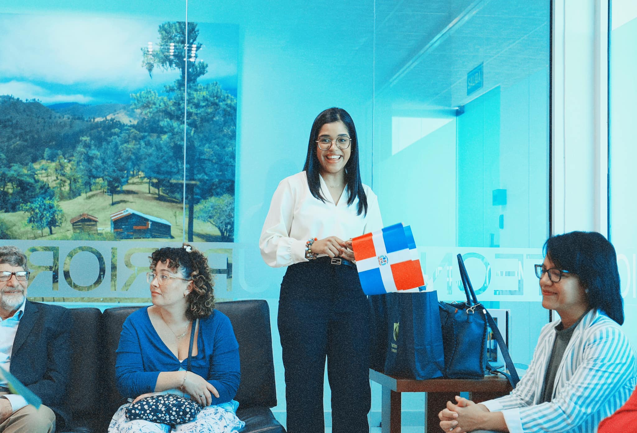 Giselle holding Dominican Flags