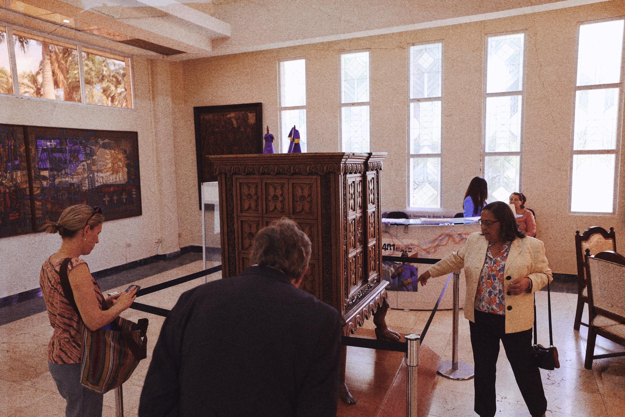 Clara explaining the 16th century wooden podium used by bishops for lectures