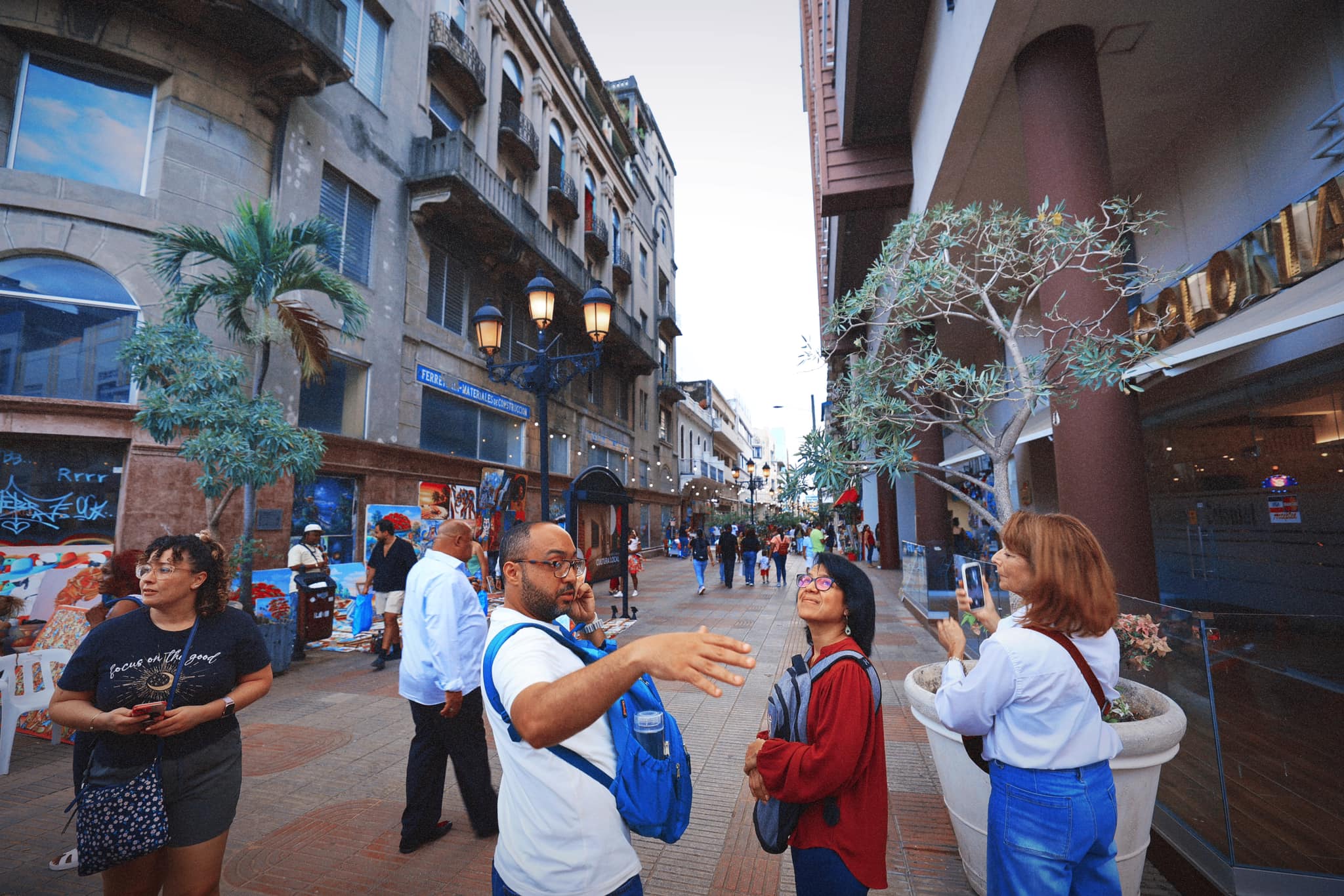 Rafael explaining colonial architecture along El Conde pedestrian street