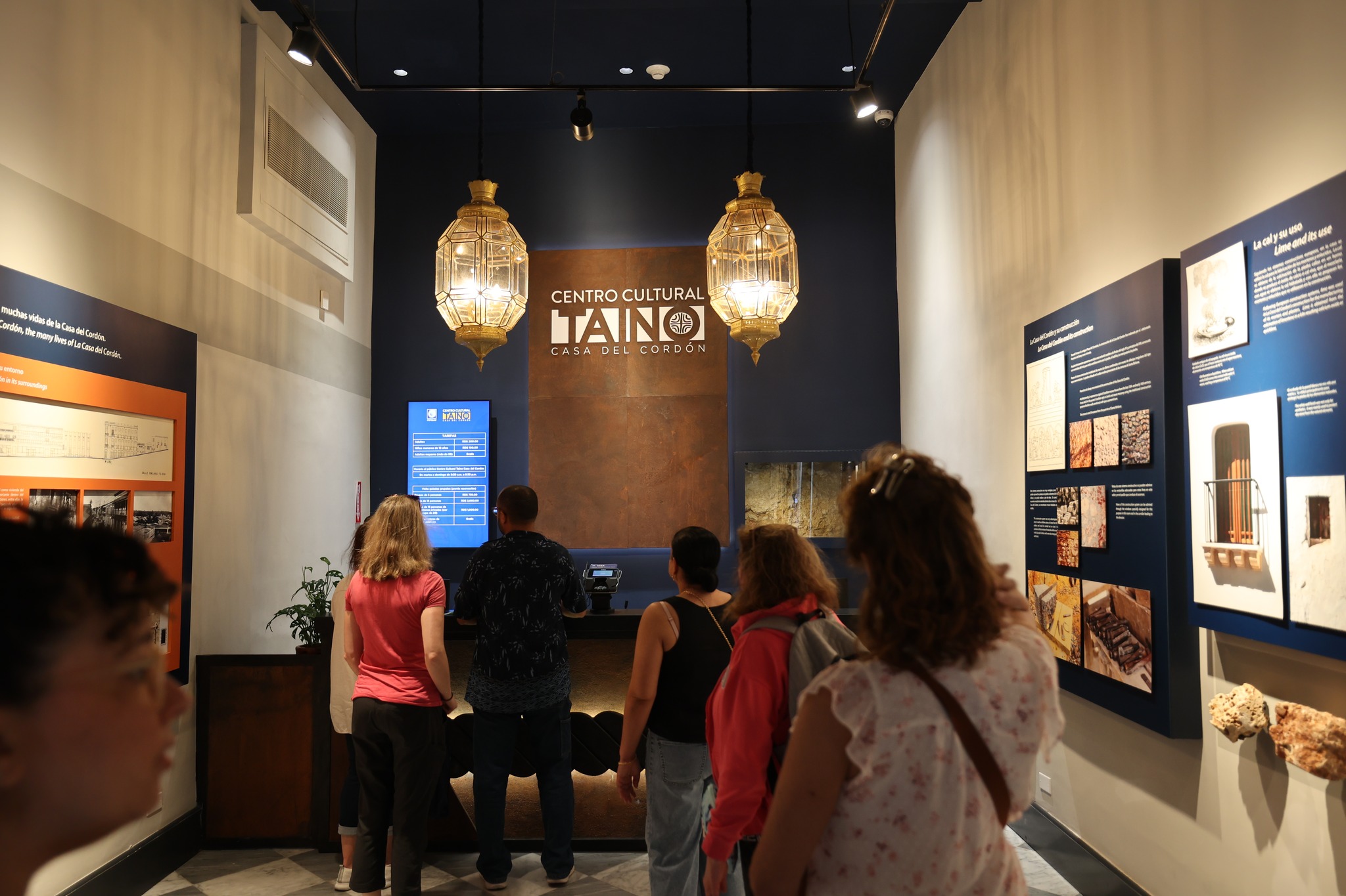 Museum entrance with Centro Cultural Taíno Casa del Cordón sign and decorative lanterns