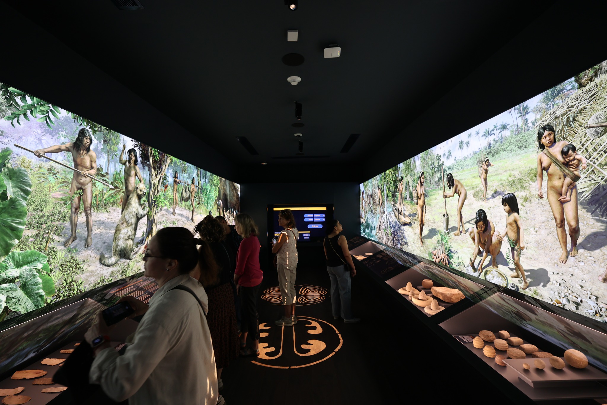 Interactive exhibit showing indigenous life with immersive wall projections