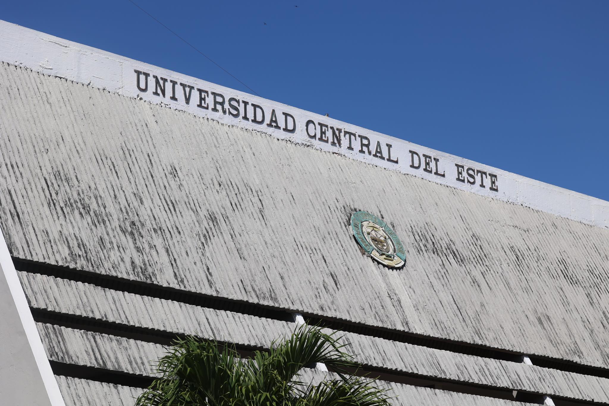 Distinctive white facade of the Universidad Central del Este building